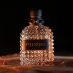 Elegant close-up of Valentino perfume bottle showcasing luxury and premium design.
